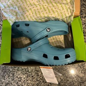 Turquoise Crocs - size W9/M7
